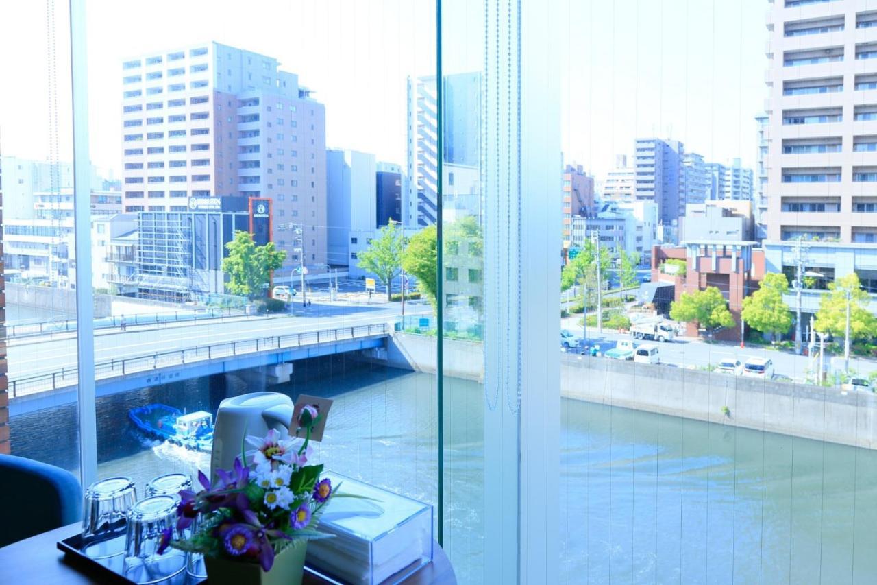 Sakuragawa Riverside Hotel - Vacation Stay 31893V Осака Экстерьер фото