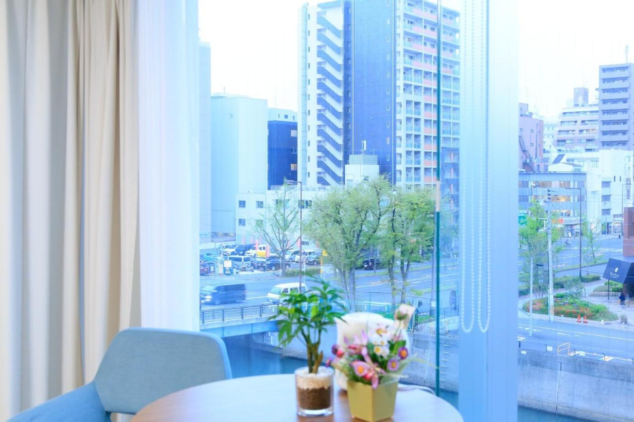 Sakuragawa Riverside Hotel - Vacation Stay 31893V Осака Экстерьер фото