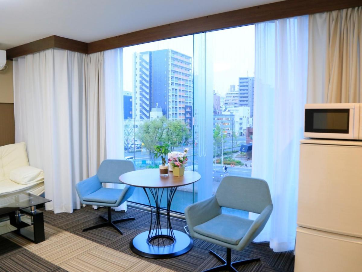 Sakuragawa Riverside Hotel - Vacation Stay 31893V Осака Экстерьер фото